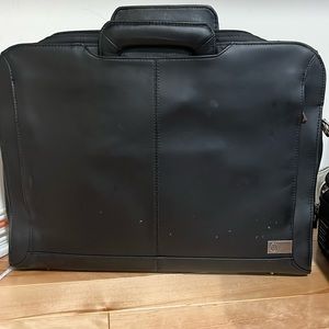 Hold the 17 inch computer and a smaller one as well by Dell side pockets w/ zip